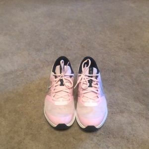 Women pink Nike sneakers